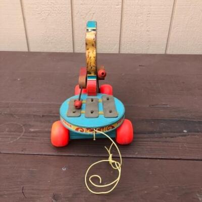 Lot 240: Teddy #741: Fisher Price Toys, Pull and Play, Large Bear Playing Circle Xylophone 
