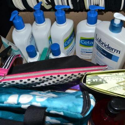 LOT 136. LOTIONS AND COSMETIC BAGS