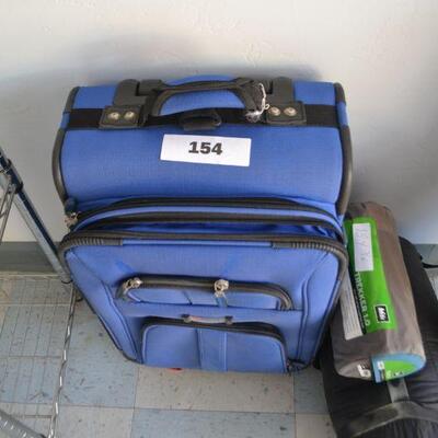 LOT 154. ROLLER SUITCASE, TENT AND 2 SLEEPING PADS