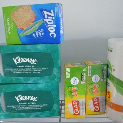 LOT 174.  NEW IN CLOSED PACKAGES KLEENEX ,ZIP LOC BAGS TRASH BAGS AND PAPER TOWELS