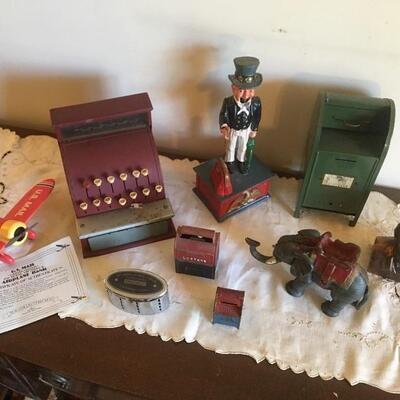 Collection of 9 Vintage Metal Coin Banks 