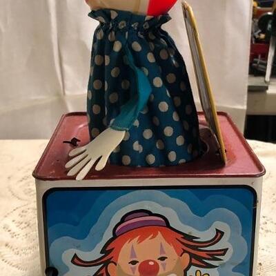 Lot 149 & 152: Jack In the Music Box: Yellow Lid, Cat, Dog, Tightrope & Jack In The Music Box: Red Top, Clown Faces on All Sides