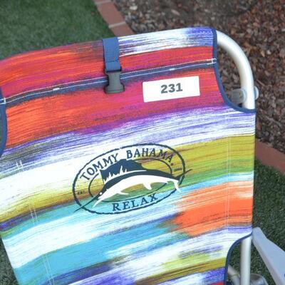 LOT 231  TOMMY BAHAMA SAND CHAIR AND BEACH UMBRELLA PLUS OTHER SAND CHAIR