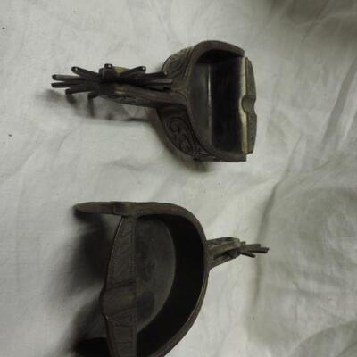 TWO METAL COWBOY SPUR ASHTRAYS