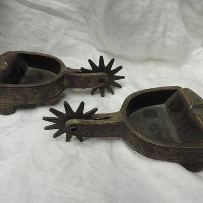 TWO METAL COWBOY SPUR ASHTRAYS