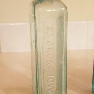 Lot #126: Assortment of (4) Antique Glass Bottles 