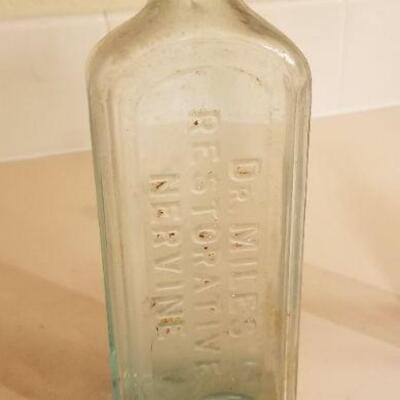 Lot #126: Assortment of (4) Antique Glass Bottles 