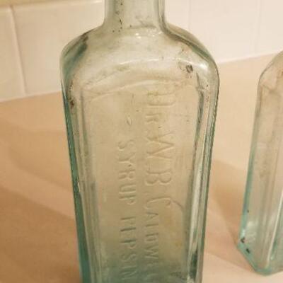 Lot #126: Assortment of (4) Antique Glass Bottles 