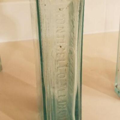 Lot #126: Assortment of (4) Antique Glass Bottles 