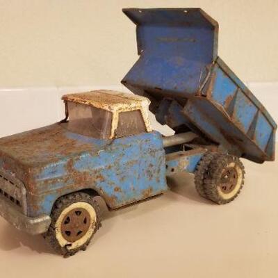 Lot #147: Vintage FORD Dumptruck (missing latch lever so bed stays in dump position)