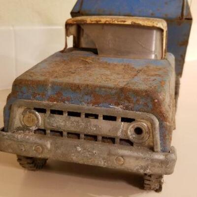 Lot #147: Vintage FORD Dumptruck (missing latch lever so bed stays in dump position)