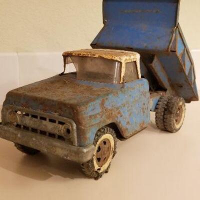 Lot #147: Vintage FORD Dumptruck (missing latch lever so bed stays in dump position)