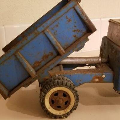 Lot #147: Vintage FORD Dumptruck (missing latch lever so bed stays in dump position)