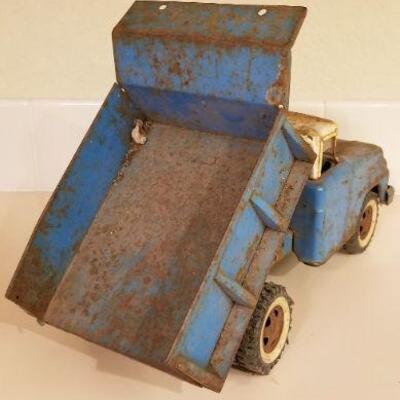 Lot #147: Vintage FORD Dumptruck (missing latch lever so bed stays in dump position)