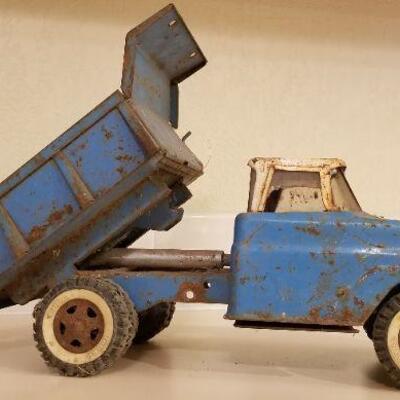 Lot #147: Vintage FORD Dumptruck (missing latch lever so bed stays in dump position)