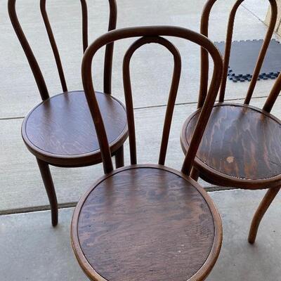 Trio of round bentwood antique chairs 