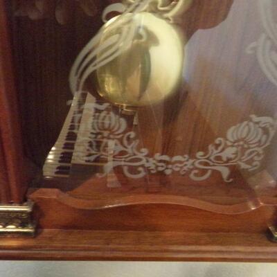 LOT 9  PENDULUM CHIME WALL CLOCK WITH ETCHED GLASS FRONT