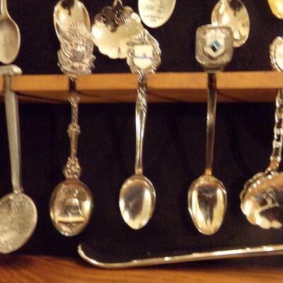 LOT 19  CASE 4 SOUVENIR SPOONS , VARIOUS SPOONS FROM NUMEROUS AREAS, TOP THREE ARE SS.