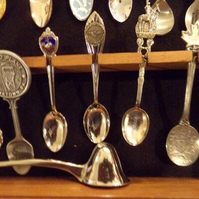 LOT 19  CASE 4 SOUVENIR SPOONS , VARIOUS SPOONS FROM NUMEROUS AREAS, TOP THREE ARE SS.