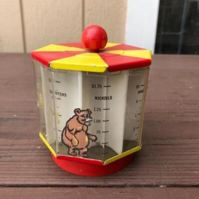 Lot 456: Superior Toy Coin Bank, Revolving: Tin & Plastic, Made in USA, 1950â€™s 