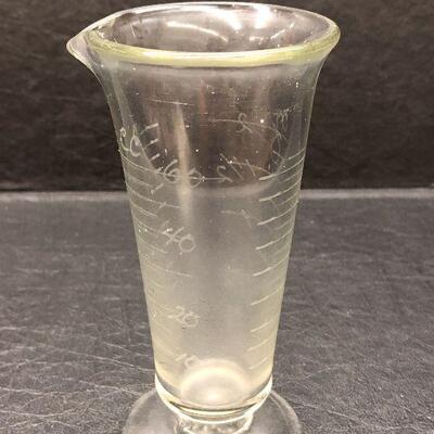 U79: Antique Glass Footed & Tapered Apothecary Wheel Etched Graduated Beaker
