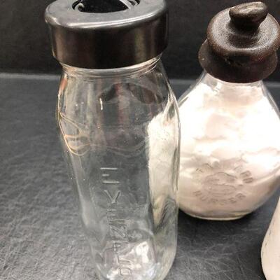 U81: Vintage Nursers and Ceramic Bottle.