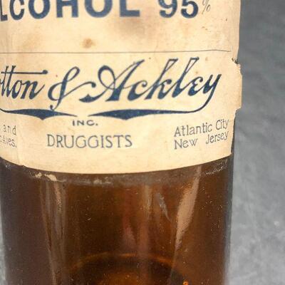 U82: Vintage Local Pharmacist Apothecary Bottles.