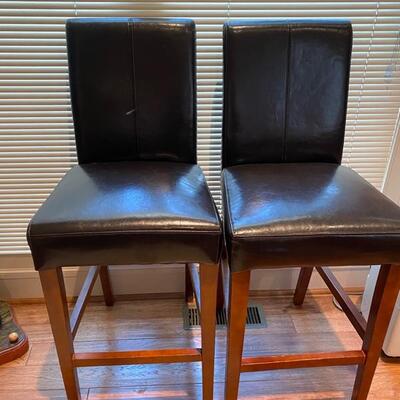 E - 603. A Pair of Leather Bar Stools