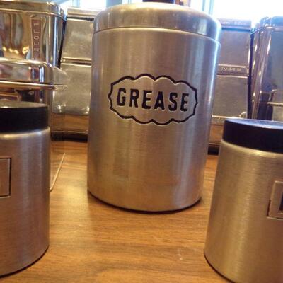 LOT 40  VINTAGE CANISTERS, GREASE STRAINER & S/P SHAKERS