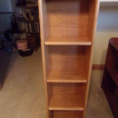 LOT 61  TWO SIDED SWIVEL WOODEN MEDIA STAND