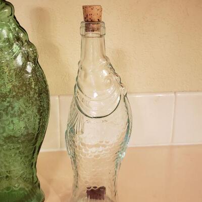 Lot 327: (2) Fish Bottles & (1) Vinegar Cruet