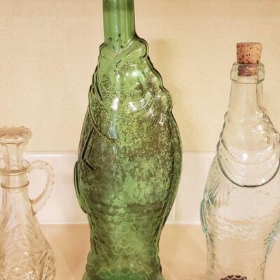 Lot 327: (2) Fish Bottles & (1) Vinegar Cruet