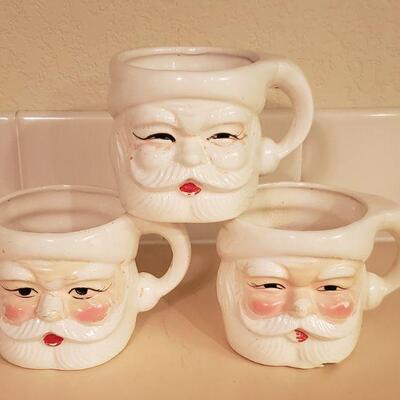 Lot 368: Vintage White Santa Mugs 