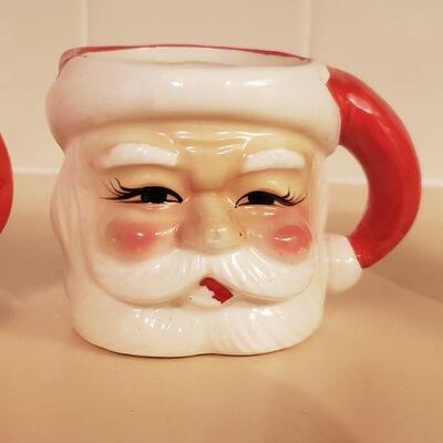 Lot 369: (4) Vintage Red & White Santa Mugs