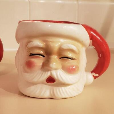 Lot 369: (4) Vintage Red & White Santa Mugs