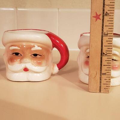 Lot 369: (4) Vintage Red & White Santa Mugs
