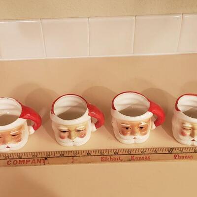 Lot 369: (4) Vintage Red & White Santa Mugs