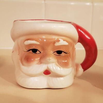 Lot 369: (4) Vintage Red & White Santa Mugs