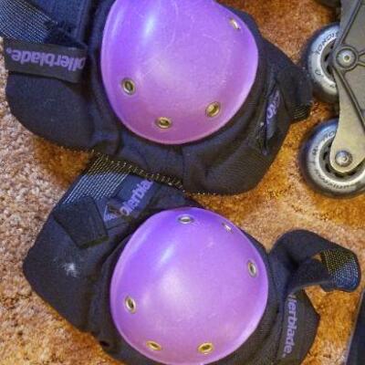 Lot #389: Vintage Pair of US Mens 8.5 Rollerblades and Assorted Knee Guard Protectors