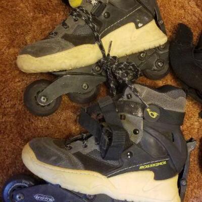 Lot #389: Vintage Pair of US Mens 8.5 Rollerblades and Assorted Knee Guard Protectors