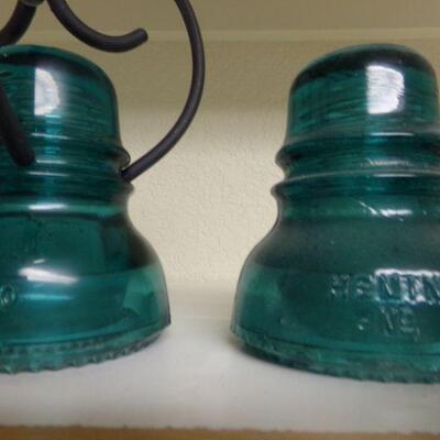 LOT 68  ANTIQUE FOUR ELECTRICAL INSULATORS & GLASS STORAGE CANISTER