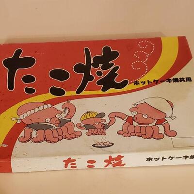 Lot 427: Asian Octopus Mold Set