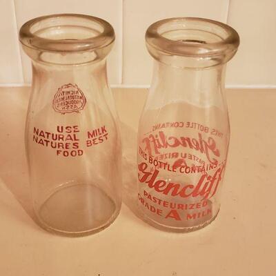 Lot 433: (2) Small Milk Bottles with Red Graphics