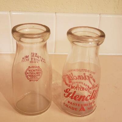Lot 433: (2) Small Milk Bottles with Red Graphics