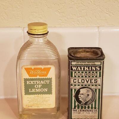 Lot 468: Vintage Cloves and Lemon Extract  Containers 