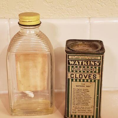 Lot 468: Vintage Cloves and Lemon Extract  Containers 