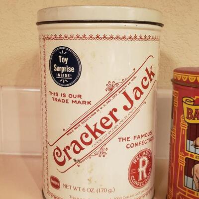 Lot 470: Vintage Cracker Jack and Animal Cookie Tins