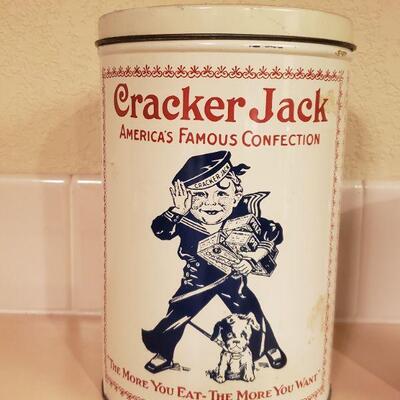 Lot 470: Vintage Cracker Jack and Animal Cookie Tins