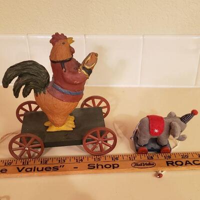 Lot 486: Rooster and Elephant Carts