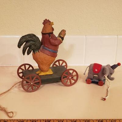 Lot 486: Rooster and Elephant Carts